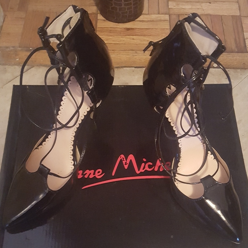 Black strap up heels